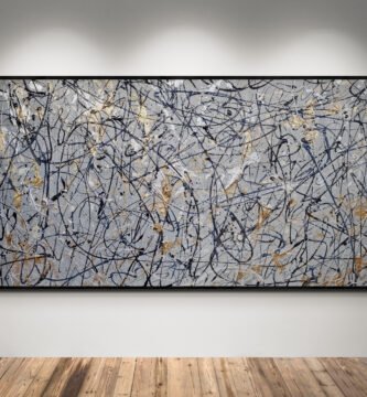 Abstract artwork in Jackson Pollock style with silver, gold, and gray tones on a large canvas, perfect for modern decor.