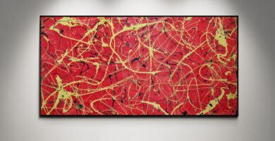 Number 13 – Vibrant Jackson Pollock Style canvas with bold red background and striking yellow and black splashes, perfect for modern interiors