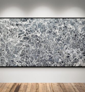 Number 30 - Jackson Pollock Style Monochrome Abstract Painting displayed in a contemporary gallery under spotlights, showcasing dynamic white and gray tones