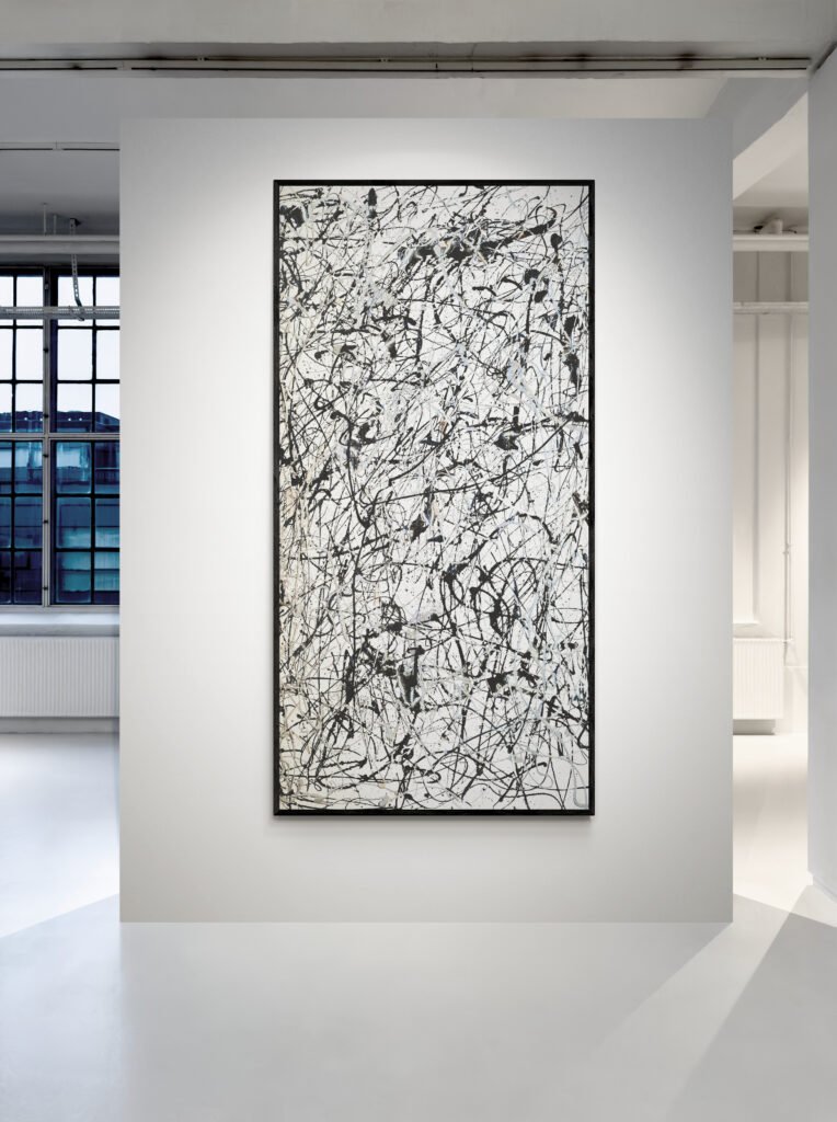 Vertical view of Number 7, Jackson Pollock Style abstract artwork with a monochrome palette, ideal for modern spaces, displayed in a bright gallery