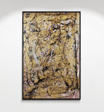 Framed abstract canvas art 'Purplegold' featuring intricate gold textures and metallic splatter, displayed in a minimalistic gallery setting