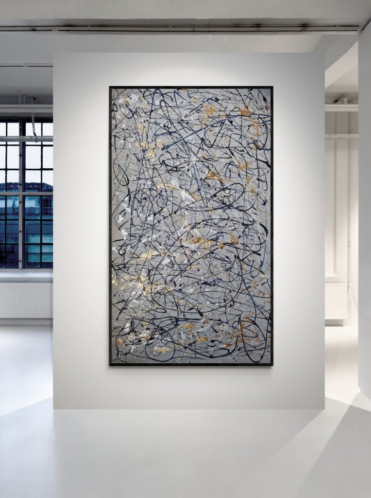 Number 10 displayed in an art gallery with focused lighting, highlighting its metallic silver and gold textures