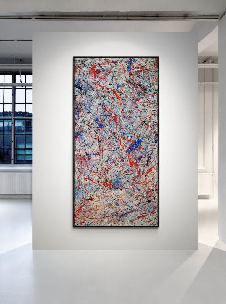 Number 20, vertical Jackson Pollock Inspired Red and Blue Abstract Canvas showcased in a bright art gallery with large windows