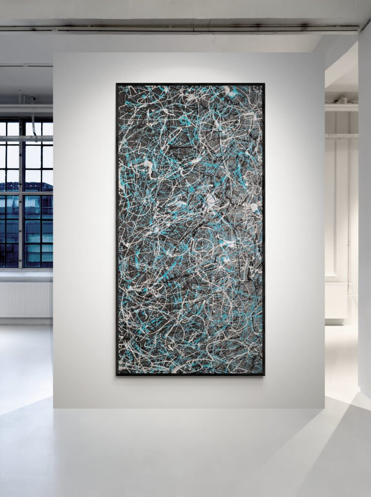 Number 27 displayed in an art gallery setting, emphasizing its bold black and turquoise splashes with abstract elegance