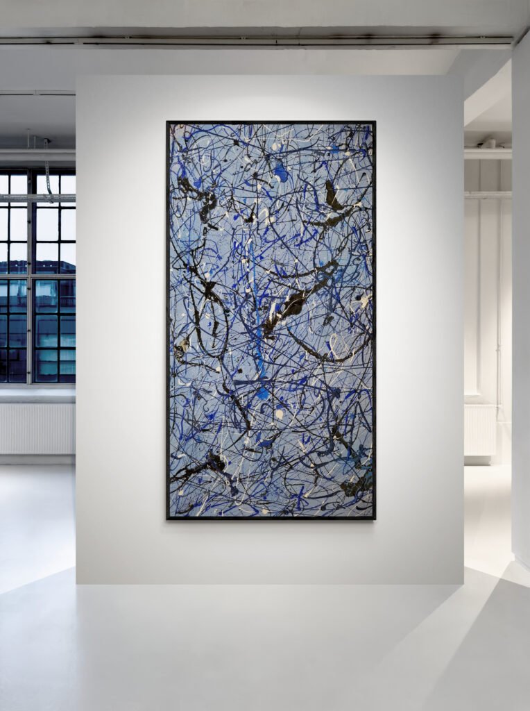 Number 14 – Jackson Pollock-style abstract canvas displayed in a modern art gallery with natural lighting