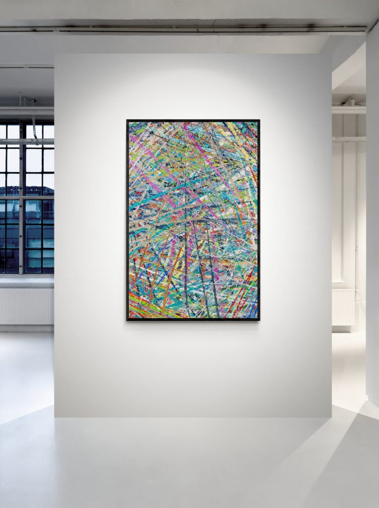 'Free' vibrant Pollock-inspired canvas displayed on a gallery wall, highlighting its intricate patterns and dynamic energy