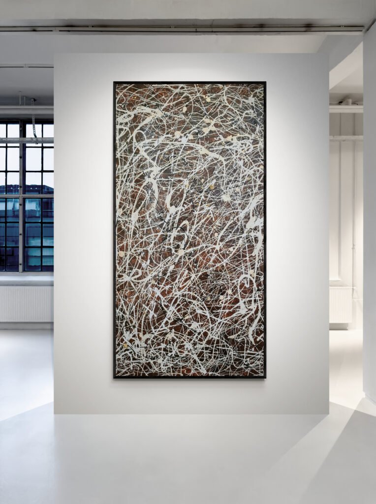 Number 15 – Vertical Jackson Pollock Style Brown Abstract Canvas showcased in a modern art gallery, emphasizing its intricate textures and earthy tones