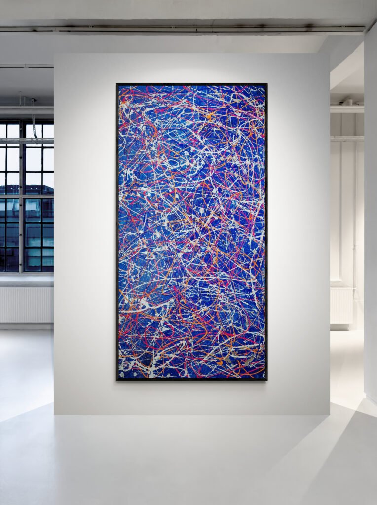 Tall abstract artwork 'Number 52' displayed in a modern gallery space with natural lighting from large windows