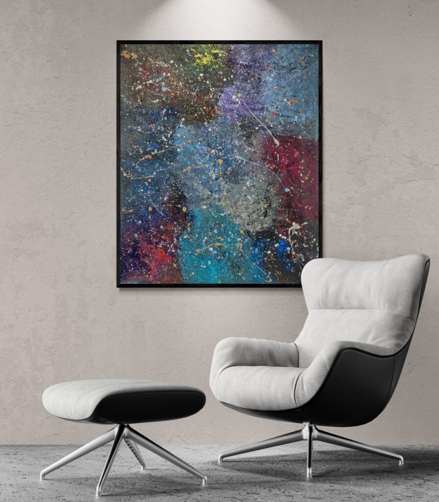 Nebula: Multicolor Abstract Canvas in Jackson Pollock's style hanging above a modern armchair with a matching footstool in a minimalist living space