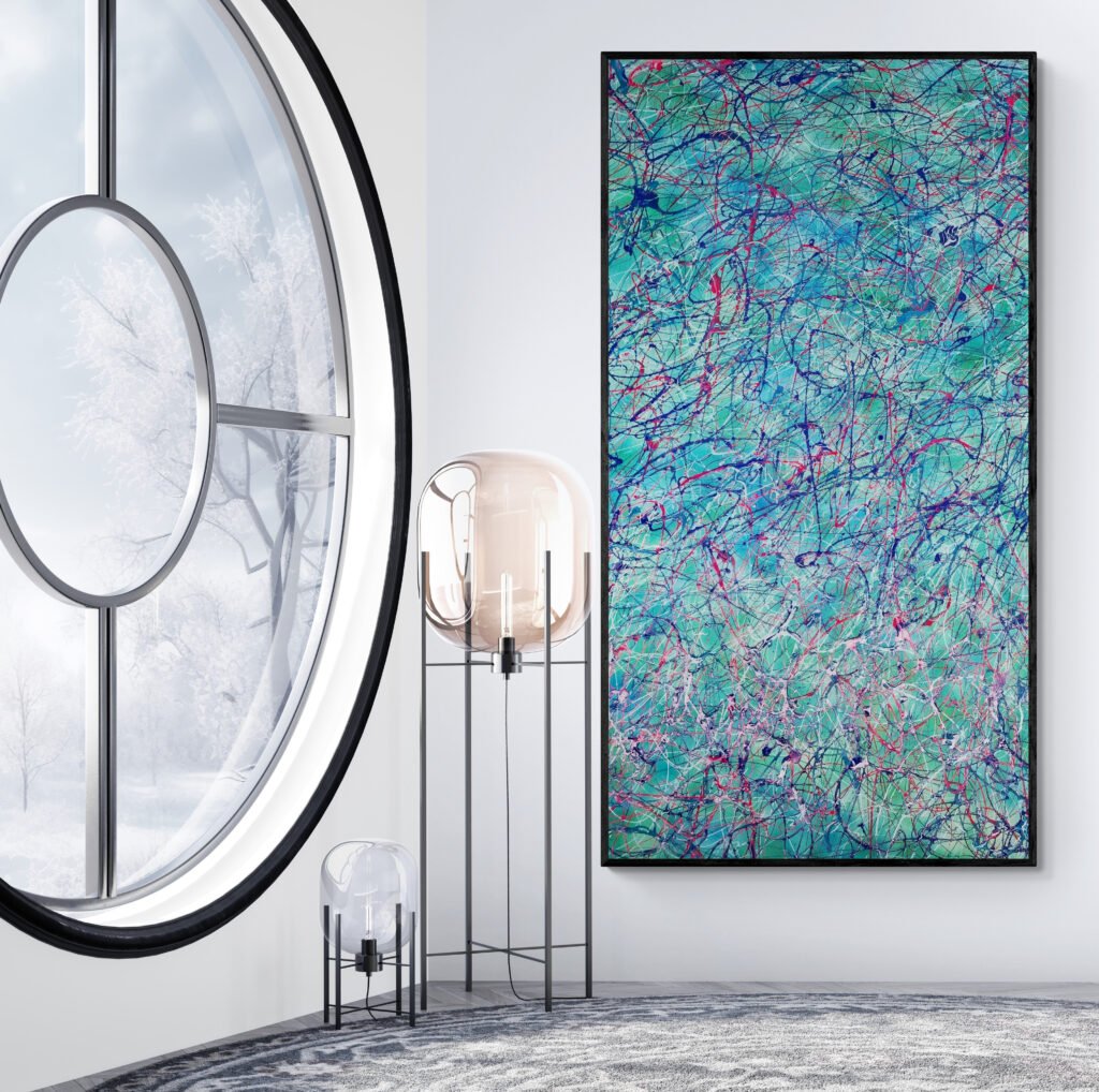 Colorful tropical abstract painting paired with contemporary decor in a chic room with a round window and winter views