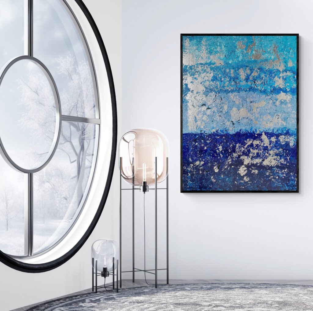 Blur abstract painting displayed in a modern room with a large round window and serene winter views