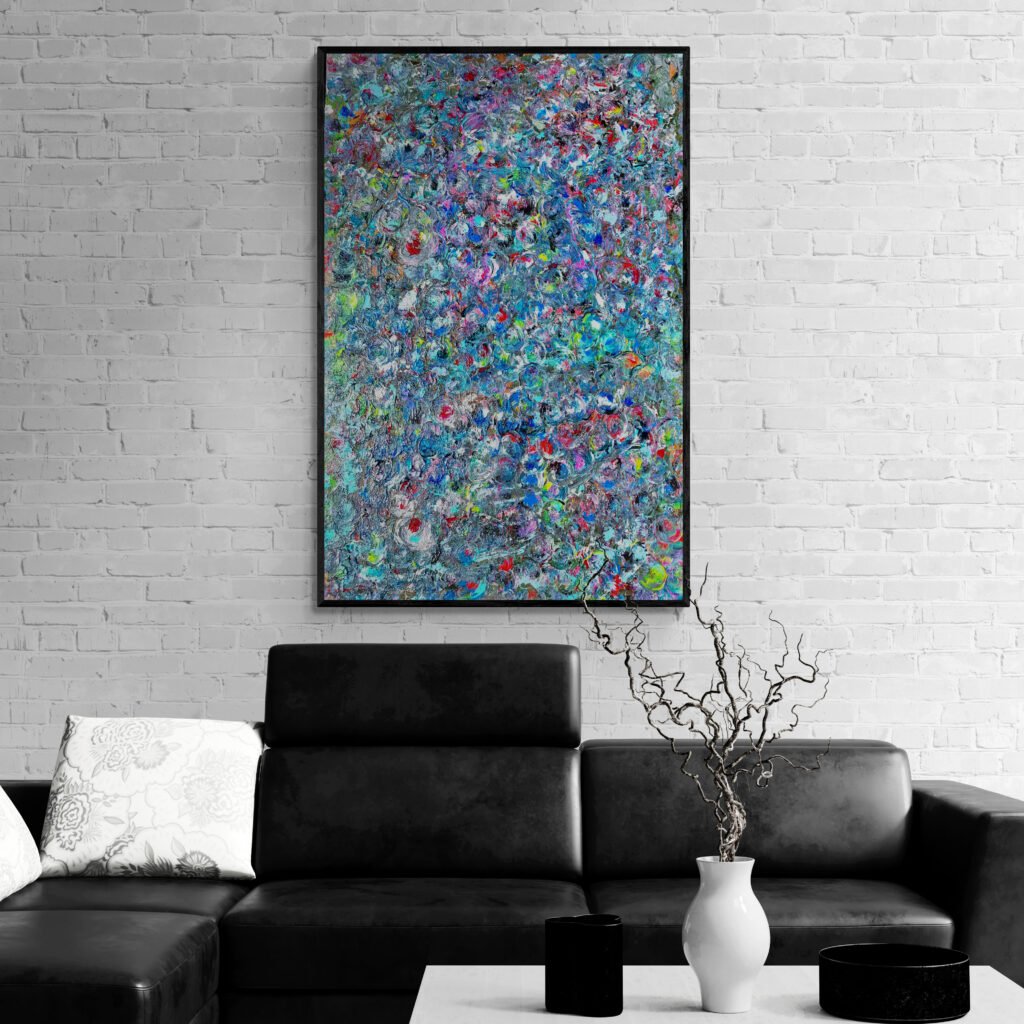 Painting hanging in a stylish living room with a sleek black leather sofa and minimalistic decor