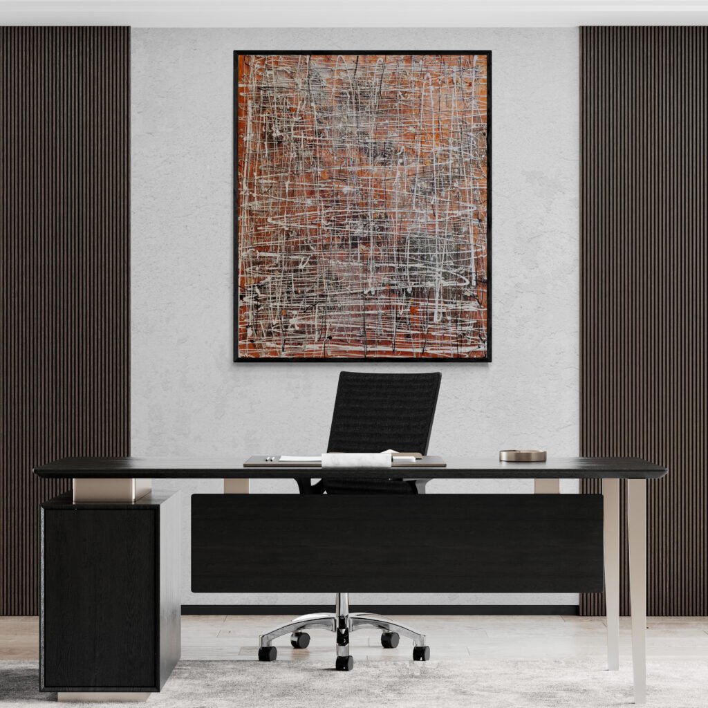 A framed Winterk painting hangs on a gray accent wall above a sleek black desk with a modern design