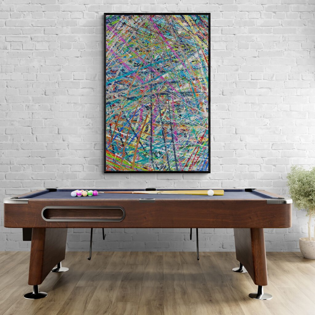 Free' abstract artwork hanging in a recreation room, accentuating the pool table with its vivid and dynamic colors