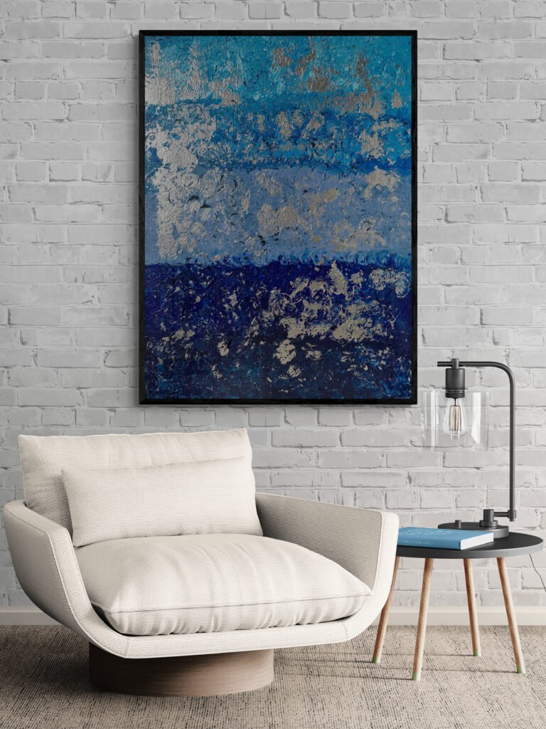 Blur abstract painting adorning a room with a contemporary armchair and a cozy atmosphere