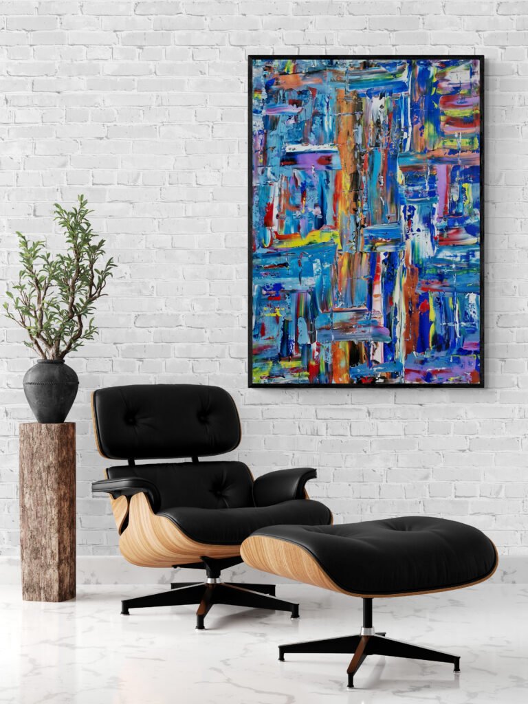 Kaled painting adds a splash of color to a contemporary living room, harmonizing with a stylish black footstool and chair