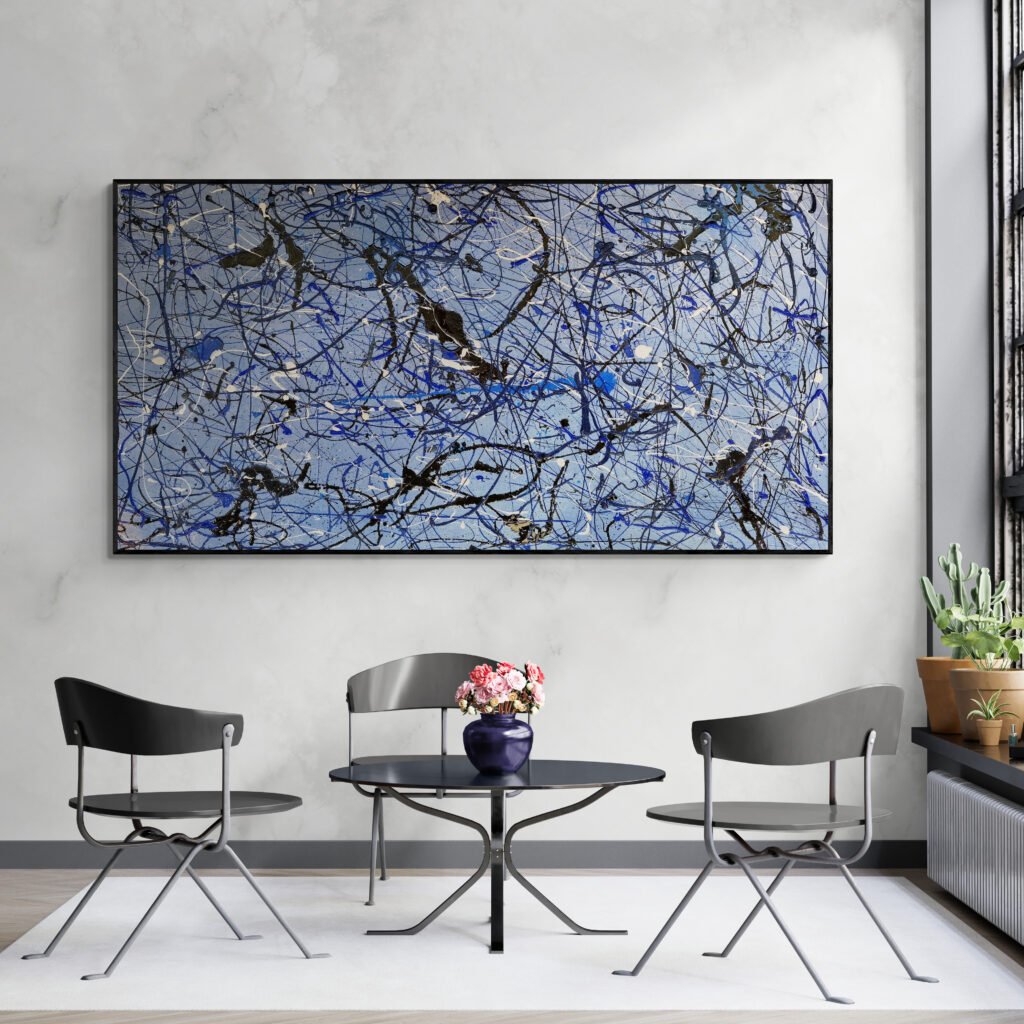 Number 14 – Blue abstract Jackson Pollock-style canvas decorating a minimalist dining room with table and chairs