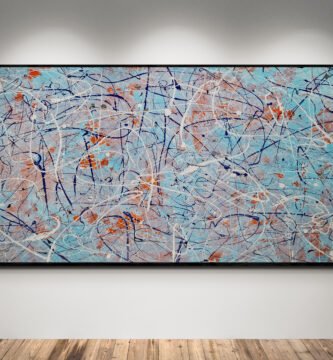 Jackson Pollock style abstract canvas in Gulf Racing colors, featuring light blue, orange, and white drip strokes on a gallery wall with wood floors.
