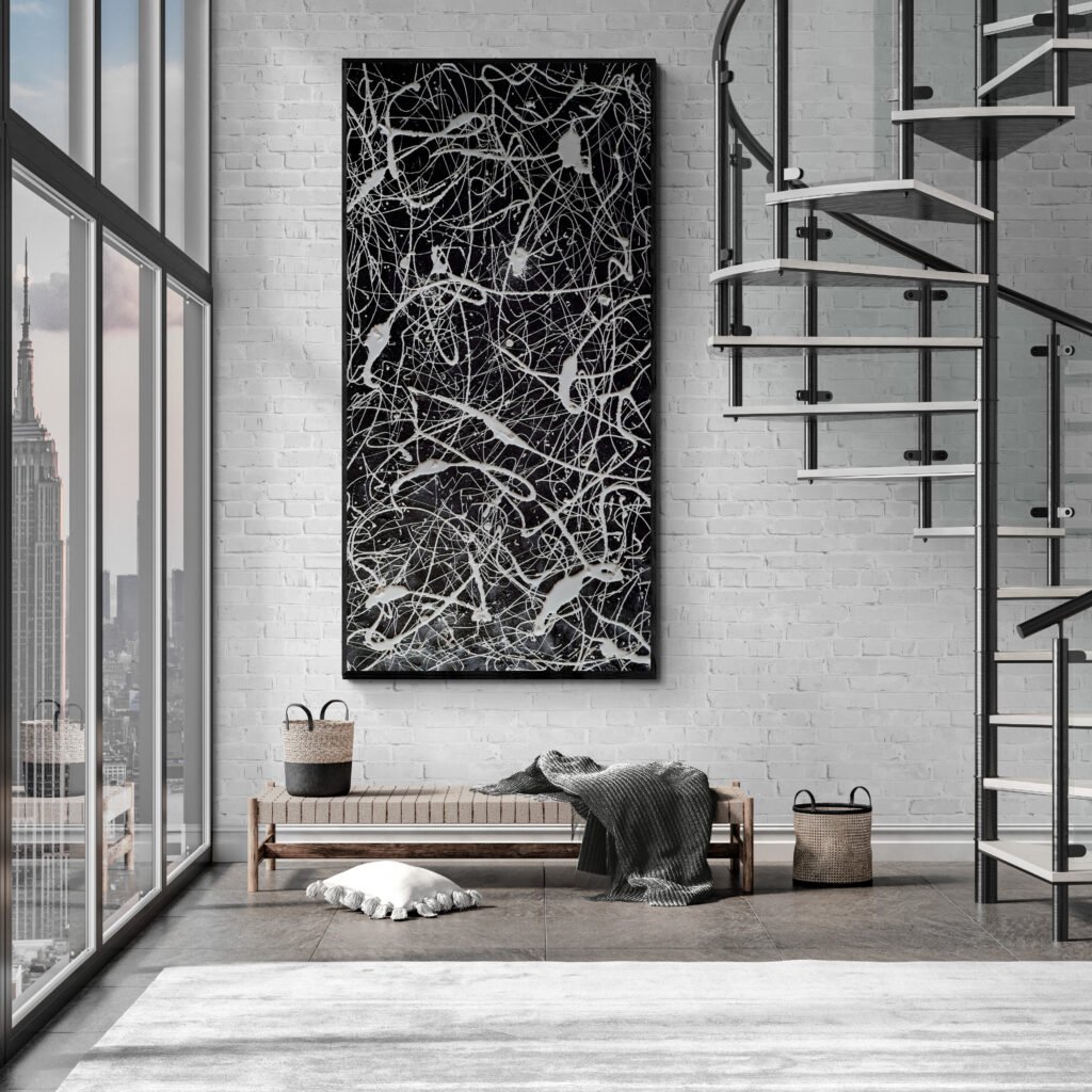 "Number 77" monochrome Pollock-style painting in bright urban loft with spiral staircase and floor-to-ceiling windows