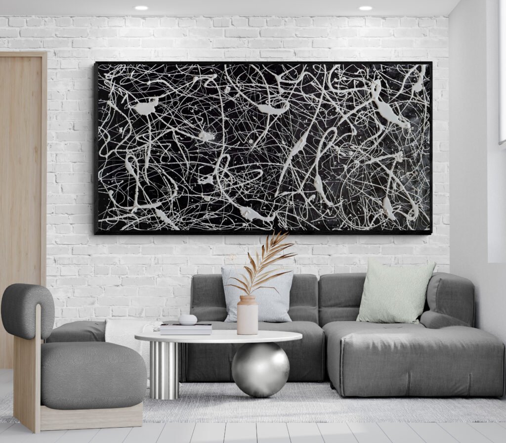 "Number 77" large Jackson Pollock inspired monochrome artwork displayed above grey sofa in stylish contemporary living room