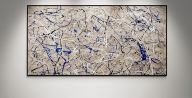 Abstract artwork Number 24 in Jackson Pollock style with beige background and blue splashes | A serene composition of movement and balance