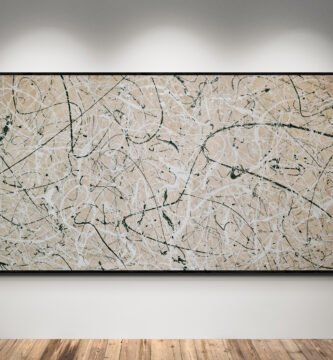 Abstract artwork Number 64 in Jackson Pollock style with forest green and silver splashes on a sand background | A natural balance of texture and calm