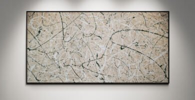 Abstract artwork Number 64 in Jackson Pollock style with forest green and silver splashes on a sand background | A natural balance of texture and calm