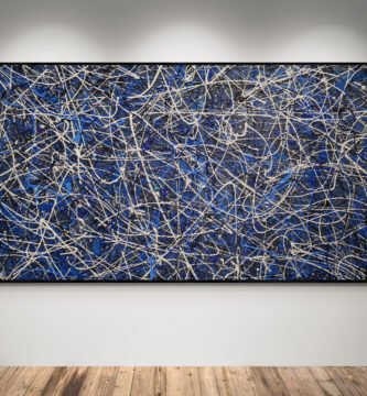 Abstract artwork Number 84 in Jackson Pollock style with deep blue background and silver splashes | A serene and elegant composition of balance and motion