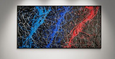 Abstract artwork Number 92 in Jackson Pollock style with BMW Motorsport colors — red, blue, and silver on a black background | A dynamic composition inspired by speed and precision