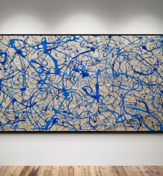 Abstract artwork Number 75 in Jackson Pollock style with ocean blue, turquoise, and metallic silver splashes on a pewter background | A fluid and modern composition of depth and light