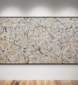 Abstract artwork Number 44 in Jackson Pollock style with sand-colored background and white, black, and silver splashes | A minimalist composition of balance and light
