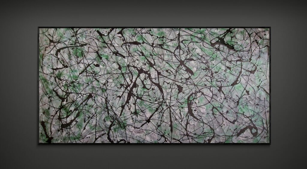 Large-scale abstract painting with black splashes and fine dripping lines over soft green and neutral tones on textured canvas