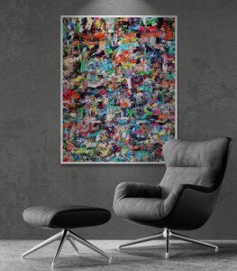 large colorful abstract wall art in modern living space with designer lounge chair