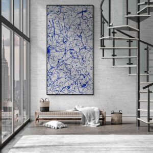 vertical blue Jackson Pollock style abstract wall art in contemporary loft interior with city view and minimalist decor