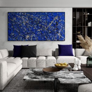 oversized pollock style blue abstract wall art with expressive splatter in modern interior